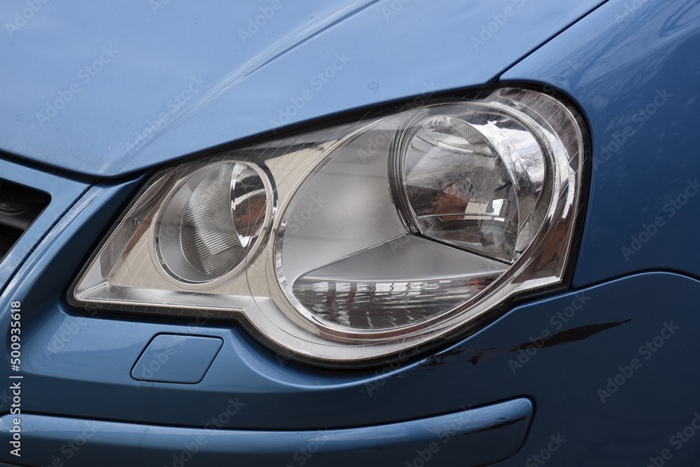 Car's exterior details.Blue car - headlight on a blue  car