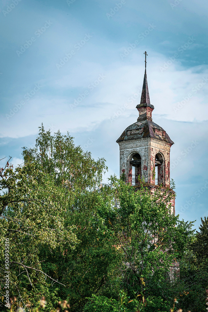 the bell tower of an abandoned Orthodox church