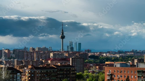Madrid skyline timelapse with a view of Cuatro Torres Business Area and TV Tower  photo