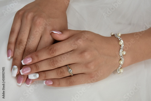 the bride shows her wedding ring