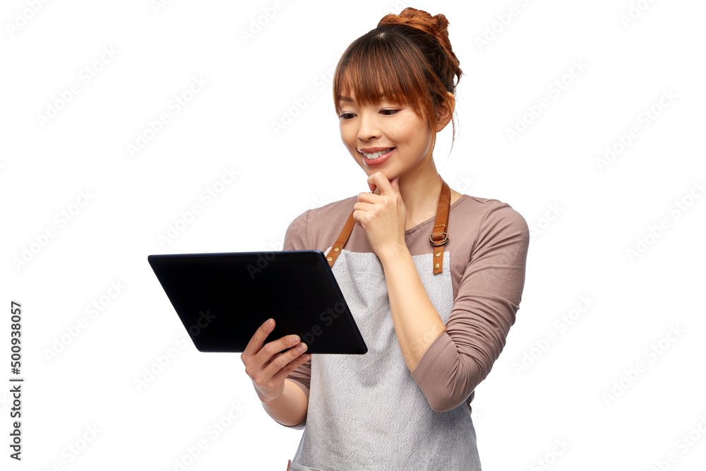 cooking, technology and people concept - happy smiling female chef or waitress in apron with tablet pc computer over white background cooking, technology and people concept - happy smiling female chef or waitress in apron with tablet pc computer over white background