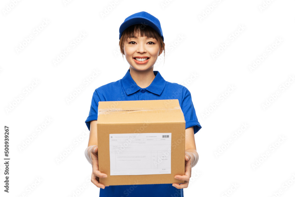 profession, job and people concept - happy smiling delivery woman in blue uniform holding parcel box over white background profession, job and people concept - happy smiling delivery woman in blue uniform holding parcel box over white background