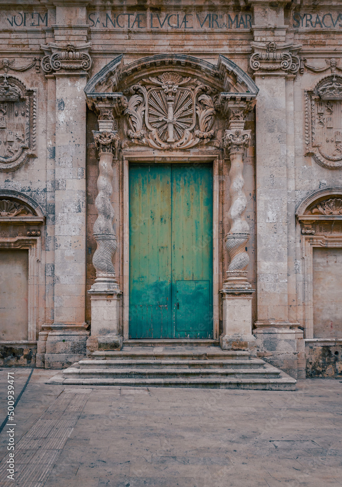 Entrance door of the Church of Santa Lucia alla Badia Entrance door of the Church of Santa Lucia alla Badia