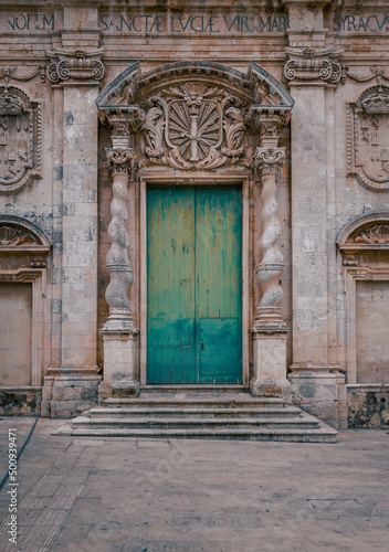 Entrance door of the Church of Santa Lucia alla Badia