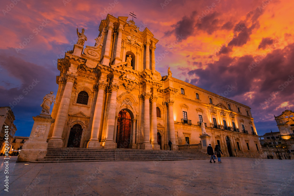Cathedral of Syracuse in Ortigia at sunset with people