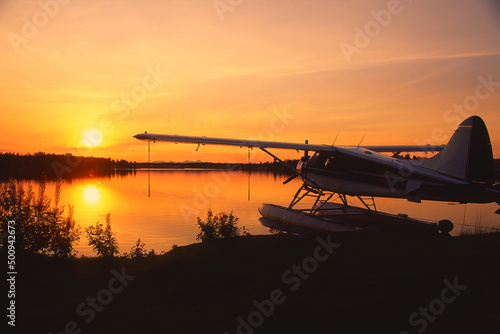 Float plane on Lake Hood at sunset, Anchorage, Alaska, USA