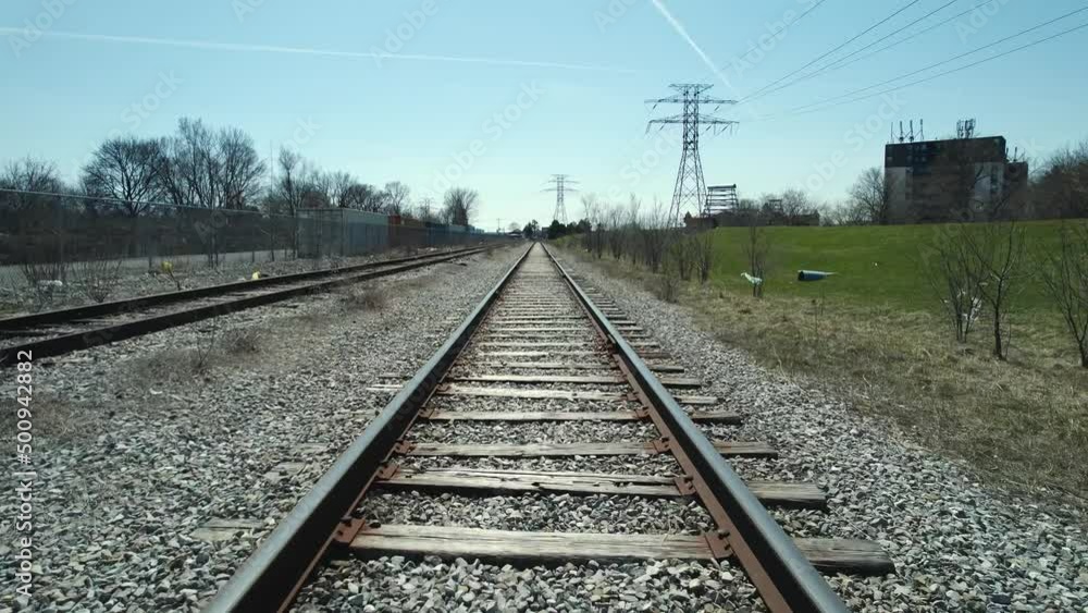 View of railroad track from the bottom of the train. Imitation of train rides at railway track. View from the front of the train. Railway track aerial fpv fast hovering over train rails. View of railroad track from the bottom of the train. Imitation of train rides at railway track. View from the front of the train. Railway track aerial fpv fast hovering over train rails.