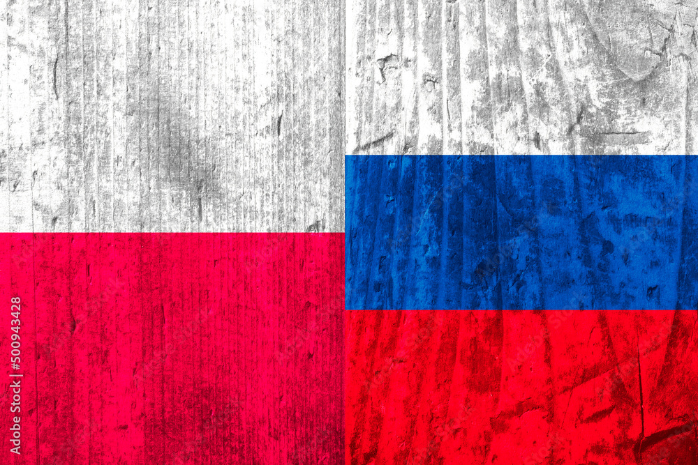 Flags of Poland and Russia on a wooden surface. Flags of Poland and Russia on a wooden surface.
