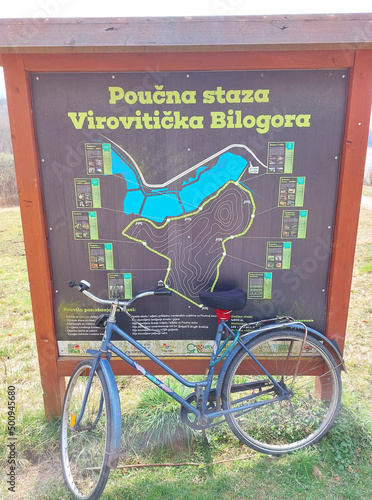 bicycle and info banner for bicycle path near Virovitica in Croatia. Educational trail Viroviticka Bilogora photo