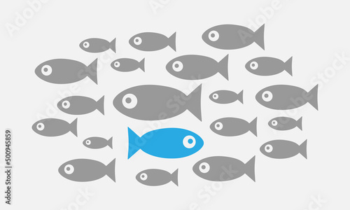 Individuality concept. Not like everyone else. Fish swims against the tide