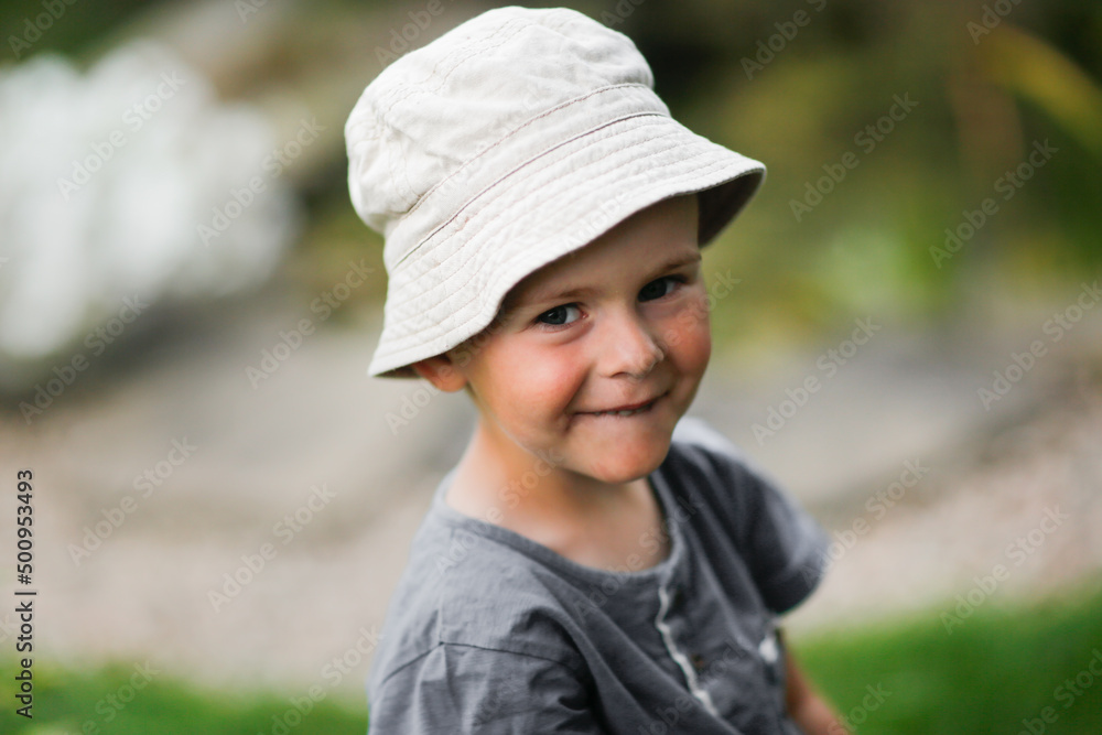 portrait of european toddler boy in panama in summer