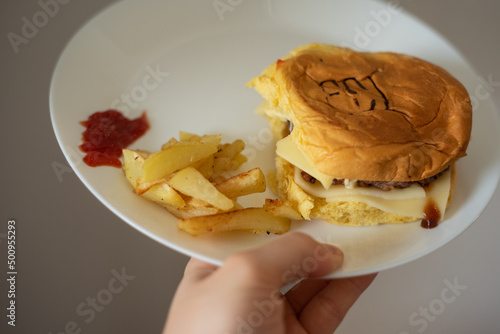 Handmade hamburger with french fries and dips made at home