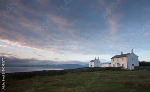 two lighthouse cottages on black point Penmon Anglsea north wales during sunrise