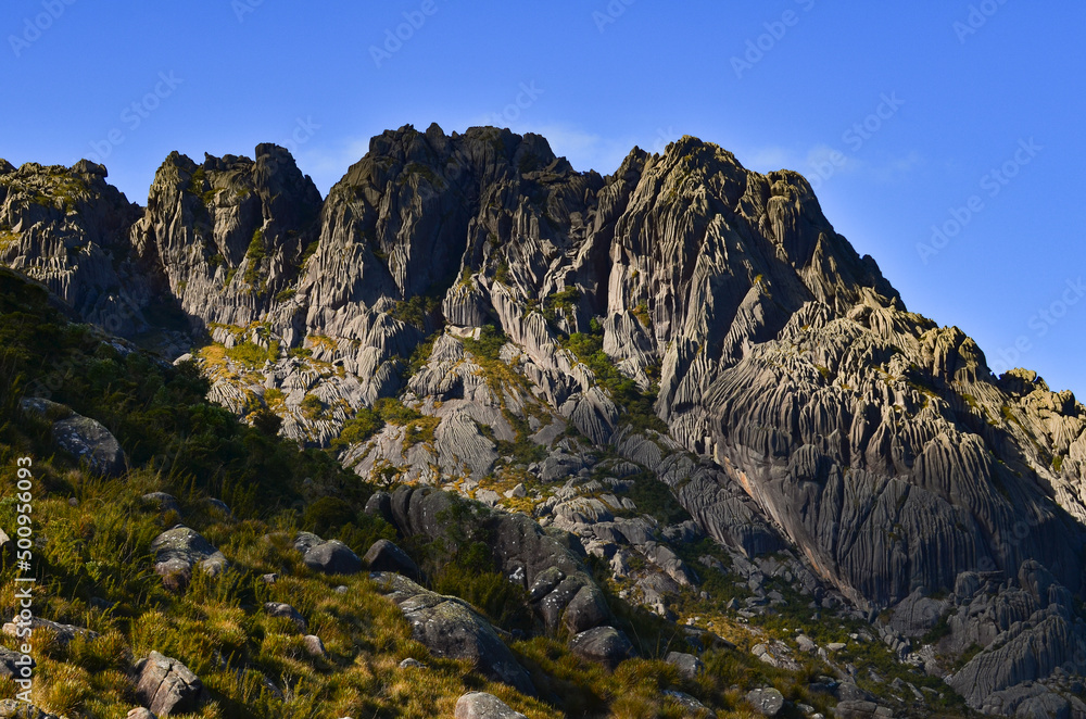 Pico das Agulhas Negras (2.791m), or Black Needles Peak, one of the highest in Brazil, towering above the boulder-filled high sector of Itatiaia National Park, Itatiaia, Rio de Janeiro, Brazil