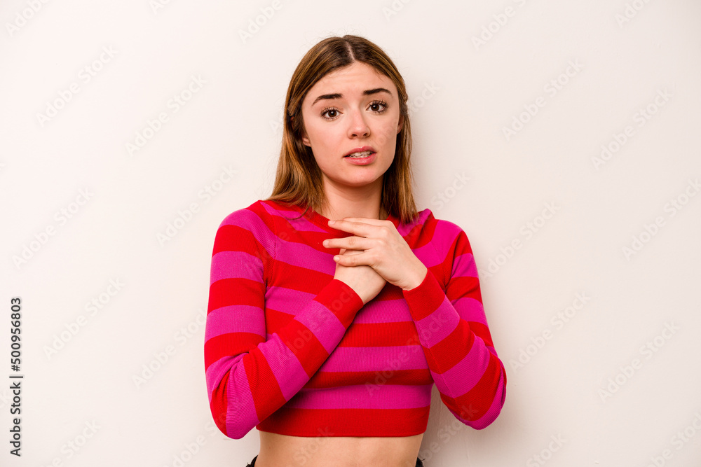 Young caucasian woman isolated on white background scared and afraid. Young caucasian woman isolated on white background scared and afraid.