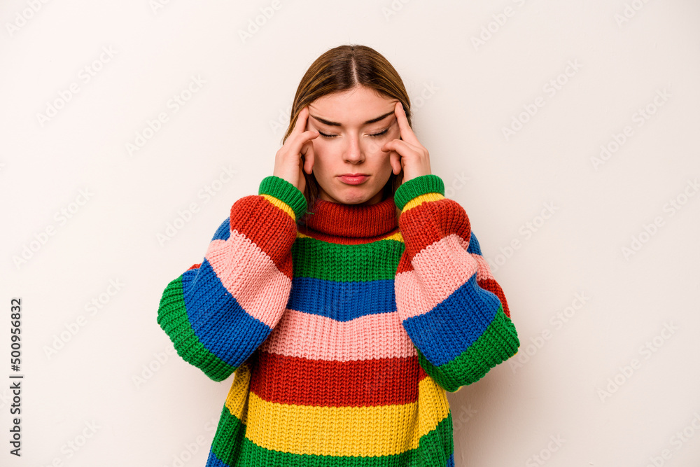 Young caucasian woman isolated on white background touching temples and having headache. Young caucasian woman isolated on white background touching temples and having headache.