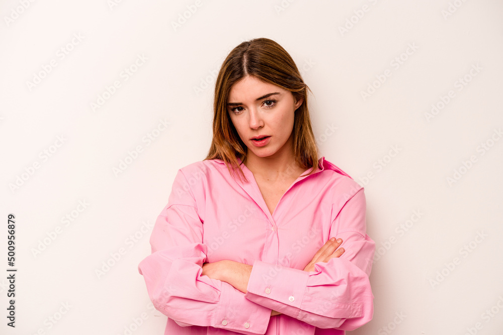 Young caucasian woman isolated on white background who is bored, fatigued and need a relax day. Young caucasian woman isolated on white background who is bored, fatigued and need a relax day.