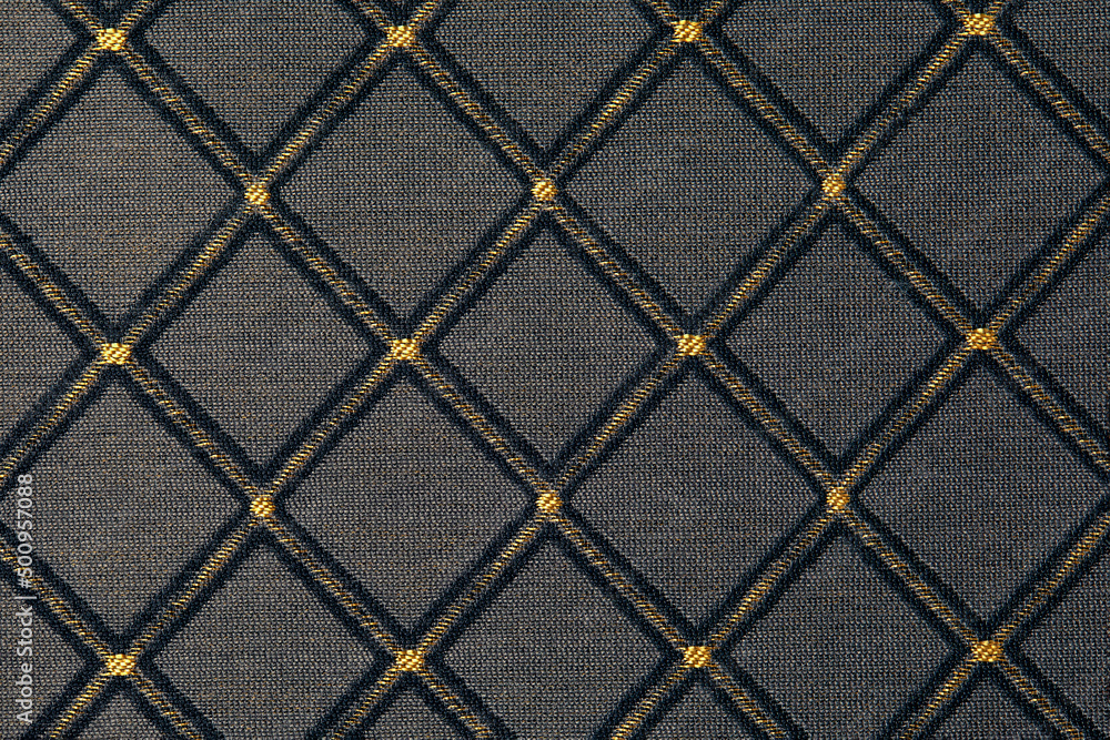 Fototapeta premium yellow-black fabric with rhombuses background for design