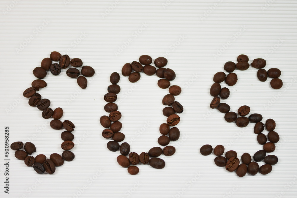 Sign S.O.S. with coffee bean Sign S.O.S. with coffee bean