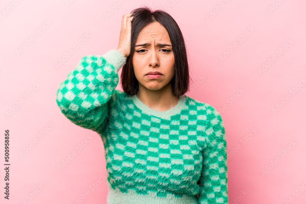 Young hispanic woman isolated on pink background tired and very sleepy keeping hand on head. Young hispanic woman isolated on pink background tired and very sleepy keeping hand on head.