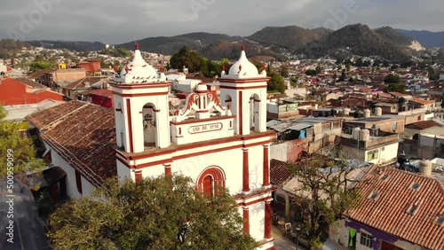 Aerial Drone shot of Church Iglesia de San Cristobalito on the mountain in San Cristobal de Las Casas, Chiapas, Mexico photo