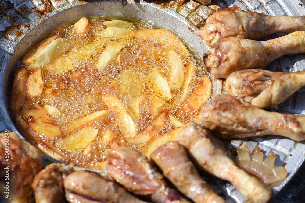crispy chicken and fried potatoes crispy chicken and fried potatoes