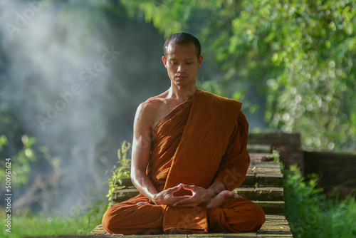 Buddhist monks meditate to calm the mind. The brain will refresh the secretion of Indoine. Make happy. photo