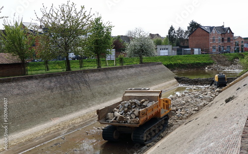 Construction work in the dry riverbed photo