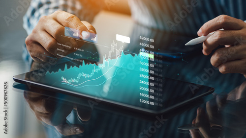 Bild auf Leinwand Business man trader investor using tablet analysis for cryptocurrency financial market