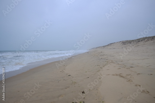 The long sand beach of Cap Ferret in front of the Atlantic ocean..