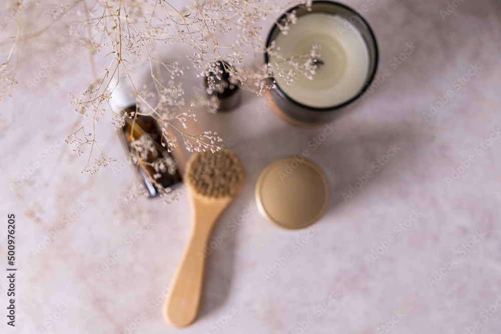 custom made wallpaper toronto digitalSelective soft focus. Skin care product for oil face massage and flowers on white table. Eco friendly organic reusable self care accessories.