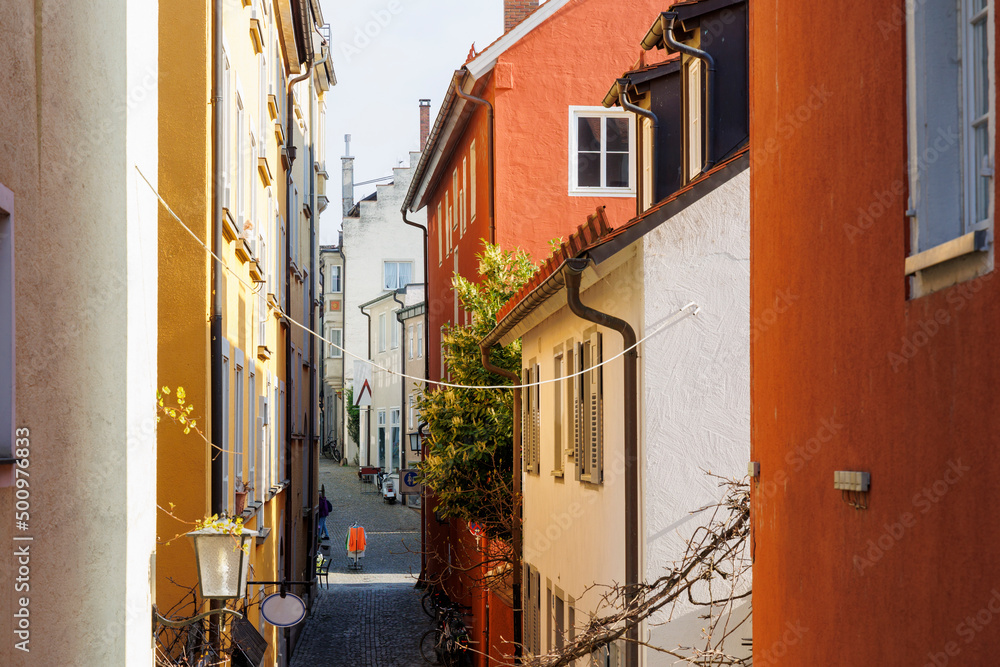 Obraz premium Houses and streets with historic residential facades in the Bavarian port city of Lindau on Lake Constance
