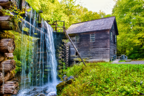 Water cascades from trough at Mingus Mill in Great Smoky Mountains National Park photo