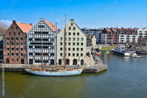 The old town of Gdańsk, a ship on the Motlawa river
