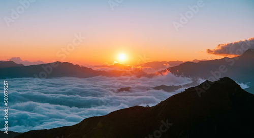 Seeing the sunrise on the sea of clouds on mountain top after a trek gives the feeling of peace, serenity and is a good practice of mindfulness.