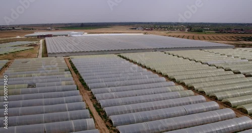 Wallpaper Mural Aerial Forward Shot Of Greenhouses In Agricultural Field On Sunny Day - Djerba, Tunisia Torontodigital.ca