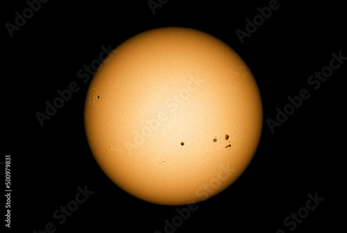 Sun in dark space with solar spots on the 25th April 2022