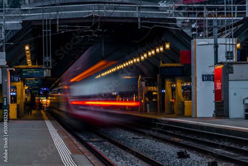 Rails and trains in Zurich main station 2022 04 03 after sunset
