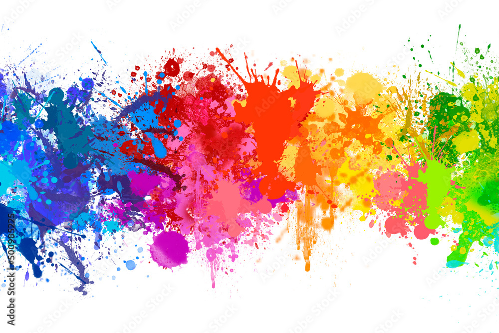 Splashing colorful watercolor colors on paper to create a background texture
