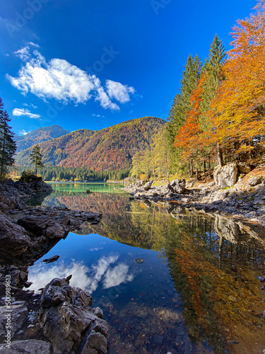 Fototapeta Naklejka Na Ścianę i Meble -  Laghi di Fusine - Friuli Venezia Giulia (Italy).
Autumn in the mountains, foliage on the lake.
Autum reflections on the lake.