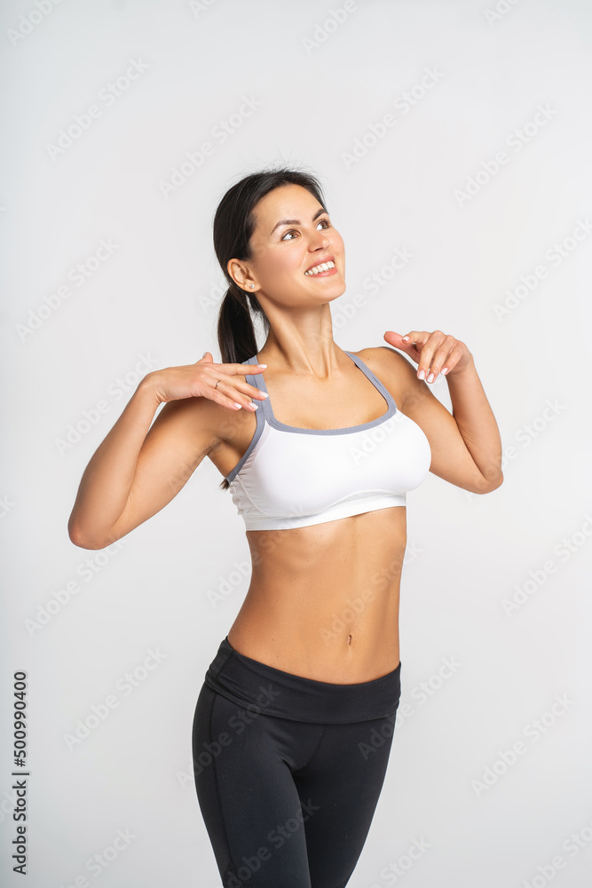 Young attractive woman practicing yoga, working out wearing sportswear , isolated,