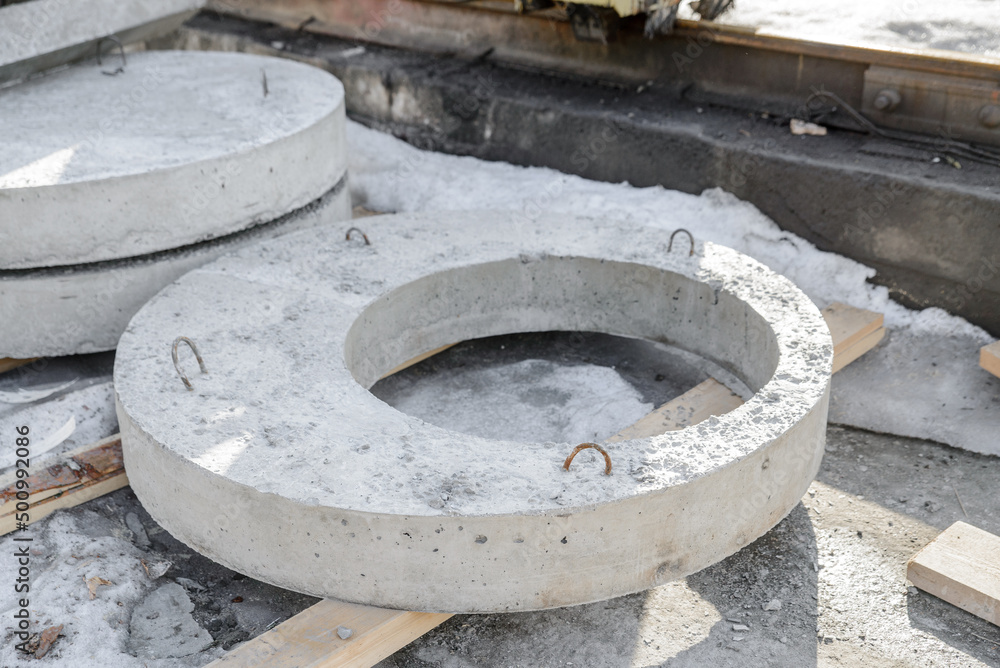 Close-up of reinforced concrete well cover, well ring floor slab.