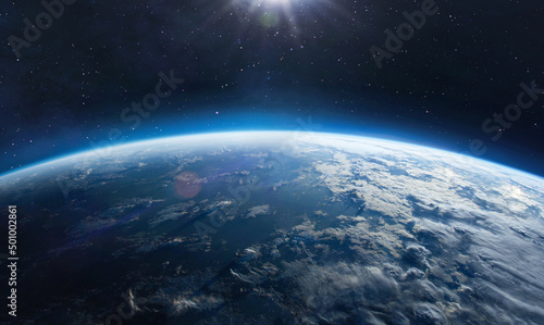 Earth surface view from orbit in space. Blue planet. Clouds and sky on horizon. Elements of this image furnished by NASA