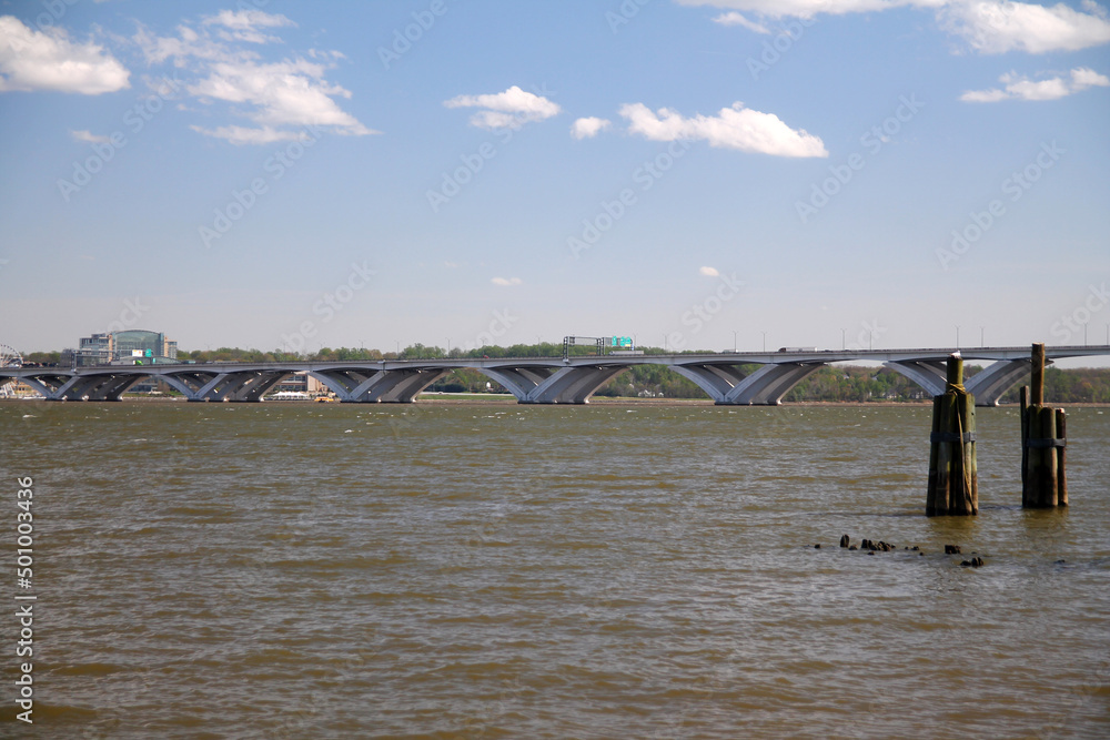 A view Woodrow Wilson Memorial Bridge over the calm Potomac river