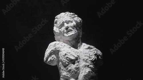 A white statue of a man. A close-up shot on a black background. © stanis88