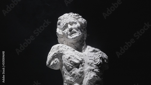 A white statue of a man. A close-up shot on a black background.