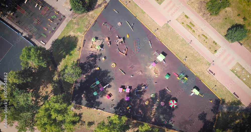 Aerial view of big modern child playground in city park. Urban development Aerial view of big modern child playground in city park. Urban development