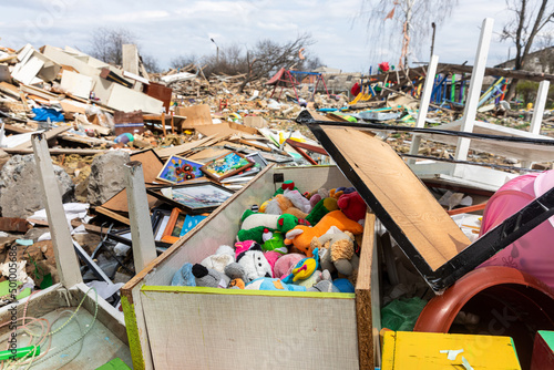 War in Ukraine. Heavily damaged kindergarten. photo