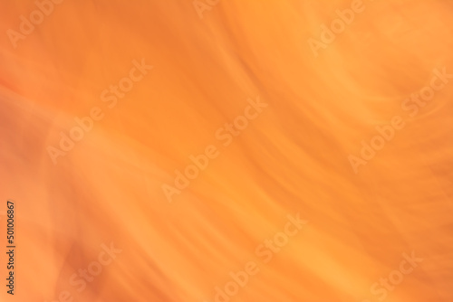 Abstract desert orange background. Small waves. Backdrop.