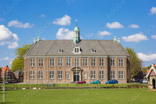 Front facade of the historic school building in Veendam, Netherlands photo